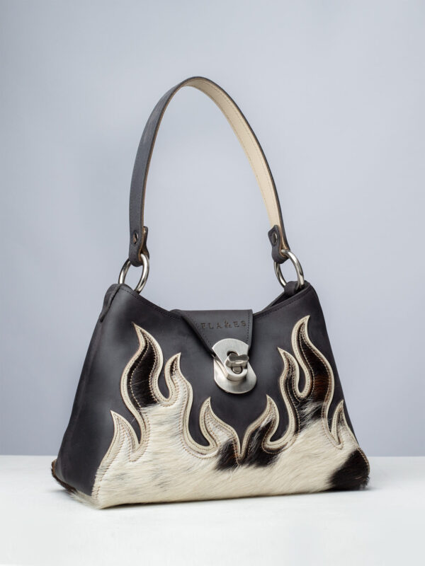 Handcrafted leather flame bag with black & white cow hide