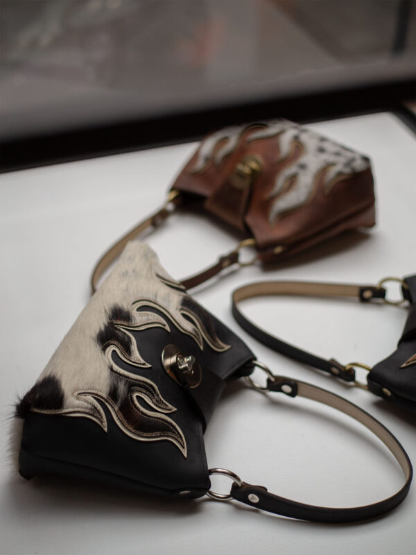 Handcrafted leather flame bag with black & white cow hide