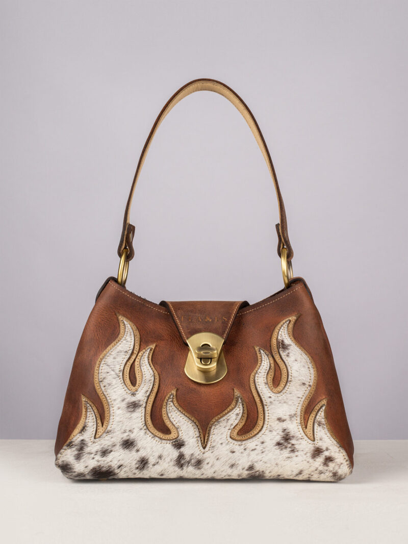 Handcrafted leather flame bag with speckled cow hide